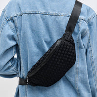 Aim High Woven Neoprene Belt Bag in black by Sol and Selene. Stylish, hands-free, and water-resistant, this versatile belt bag features a woven neoprene design with an adjustable strap, perfect for everyday wear, travel, or workouts.