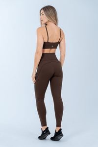 Alexandria Leggings in Mocha – High-waisted, sculpting leggings designed for movement and comfort. Made with breathable high-tech fabric, I-Red Plus technology, and EMANA® fibers for gentle compression, UV 50+ protection, and permanent anti-odor properties. OEKO-TEX Standard 100 Class 1 certified for quality and safety. Perfect for workouts or athleisure wear.