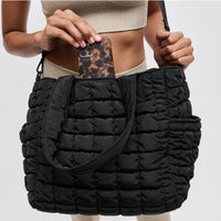 Black  Dreamer Quilted Puffer Nylon Tote with secure zipper closure, side pockets, and spacious interior featuring zip and side pockets