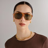 70s-inspired aviator sunglasses with a dark tort frame and khaki tint lenses, featuring a large fit and durable, impact-resistant design.