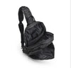 Sol and Selene Quilted Puffer Sling Backpack in black nylon with quilted design, adjustable strap, and zippered compartments.